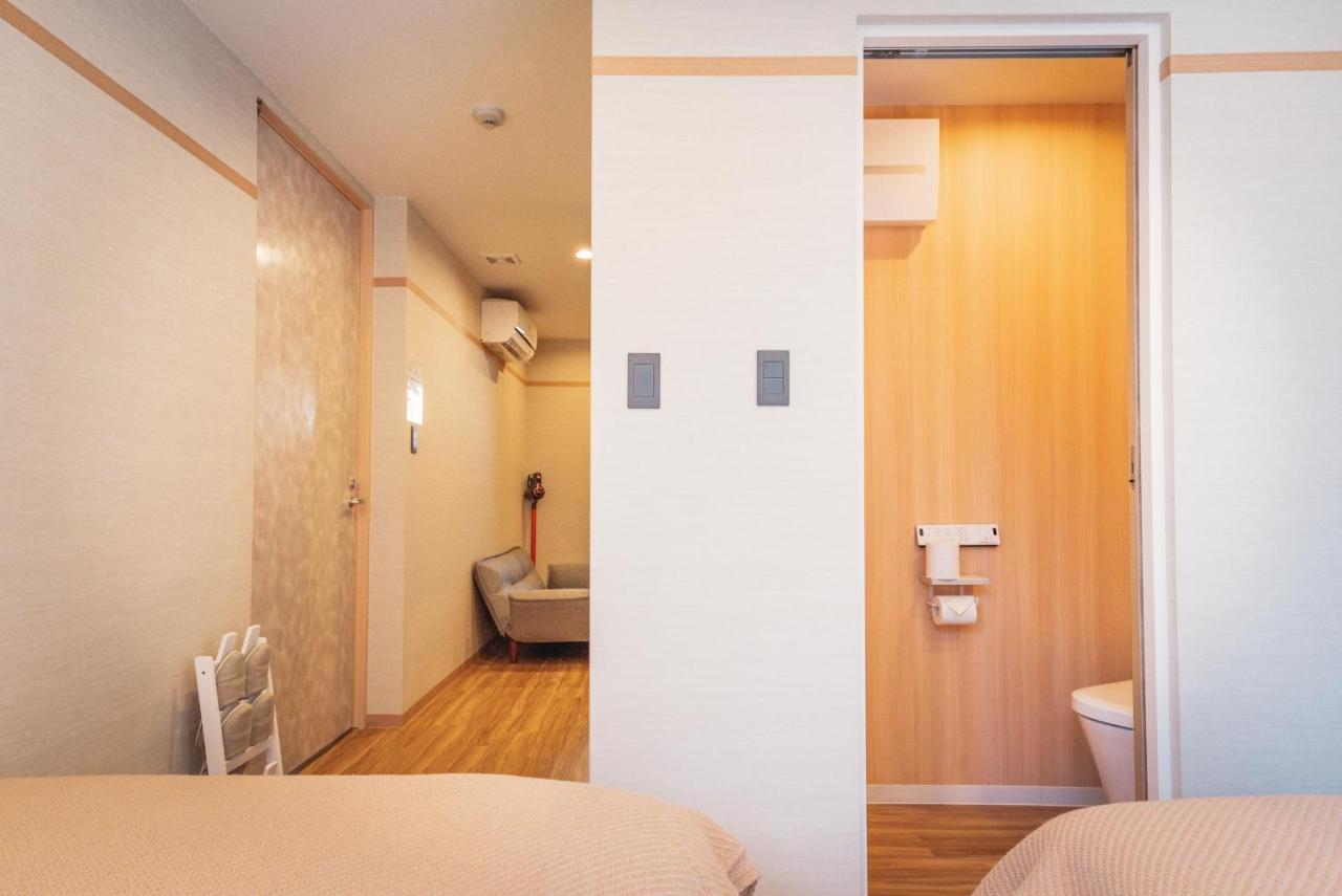 谷町君・星hotel・道頓福居 อพาร์ทเม้น